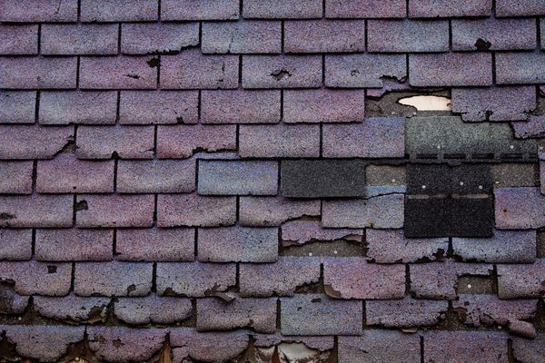 Broken shingles - Chaffey Roofing Ontario, CA